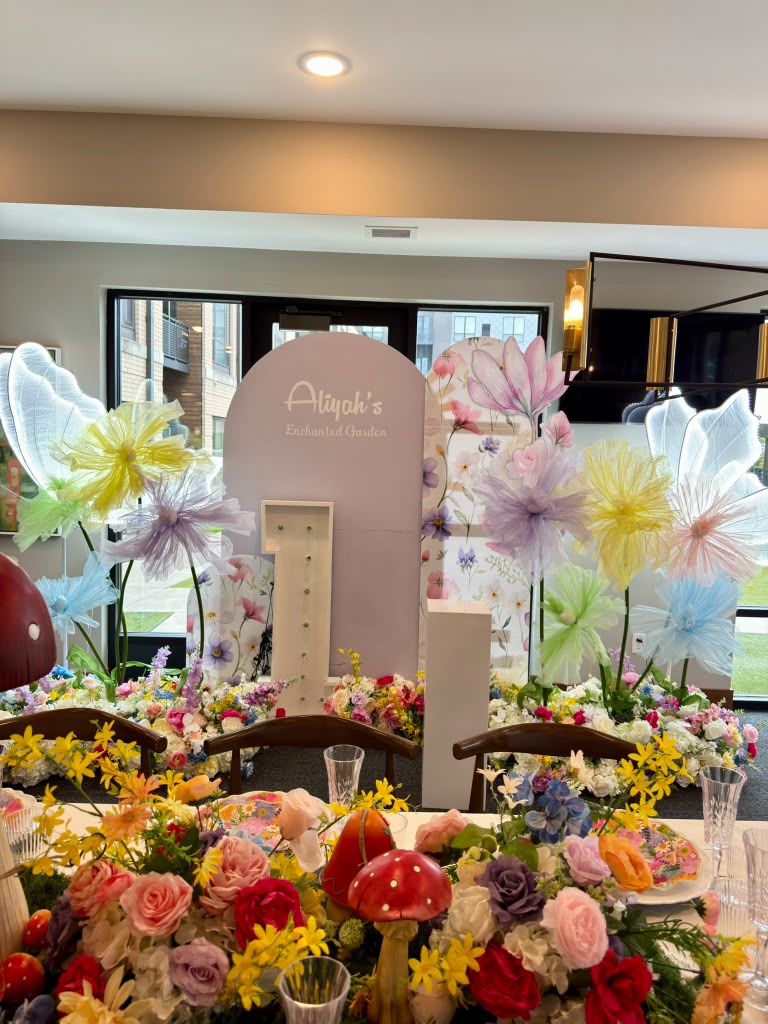 Whimsical floral celebration tablescape with colorful arrangements